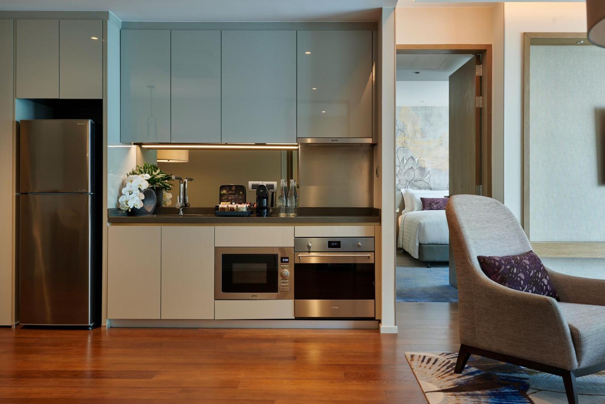Chatrium Grand バンコク都 エクステリア 写真 A kitchen in a serviced apartment