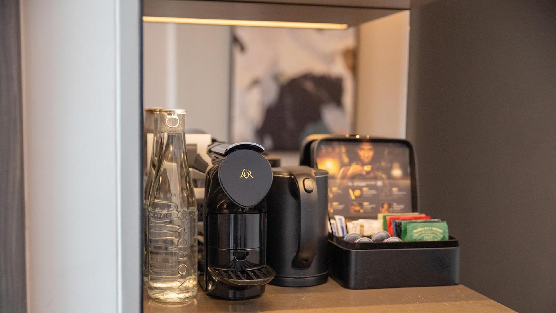 Chatrium Grand バンコク都 エクステリア 写真 A Nespresso coffee machine in a hotel room